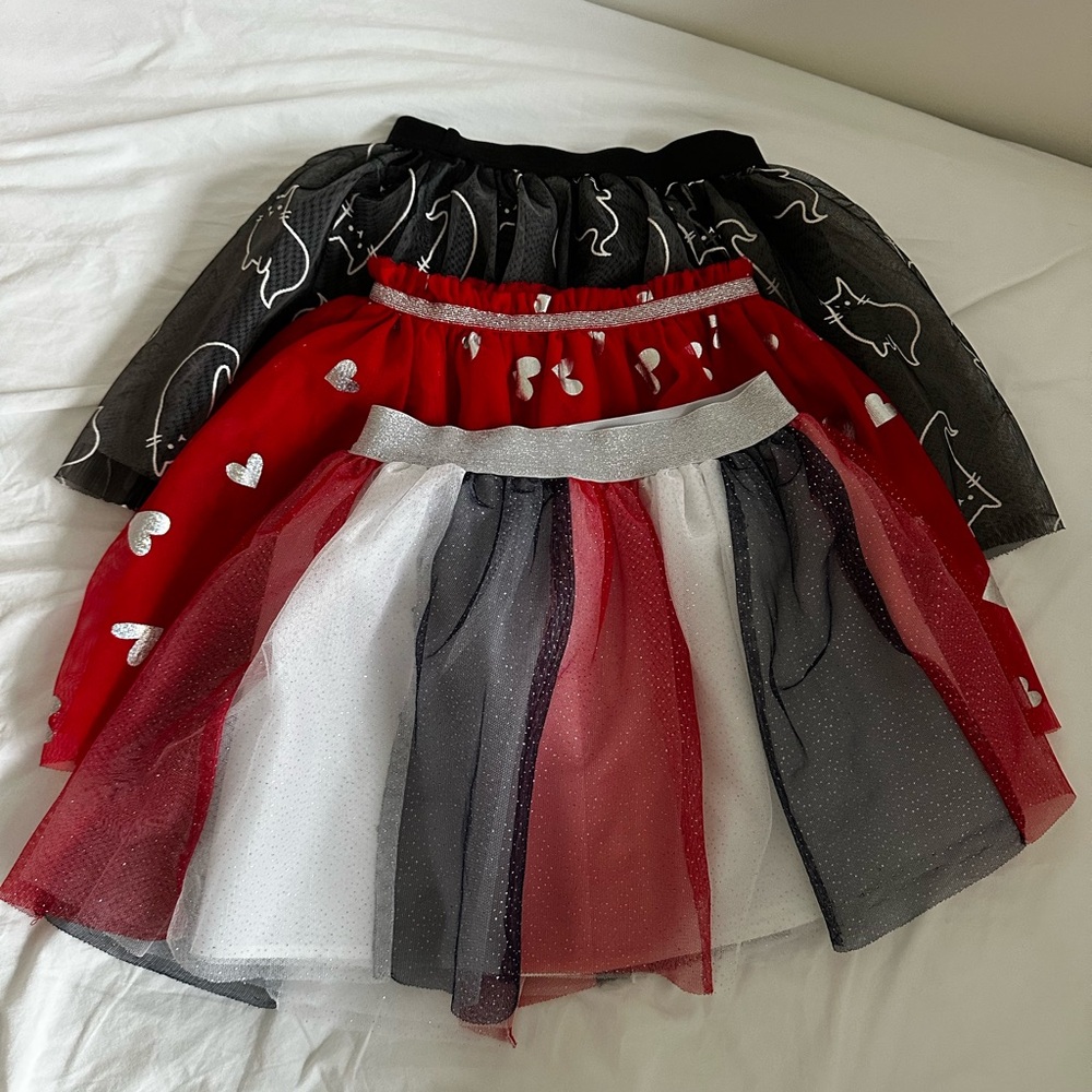 3 different kind of Girls tutus size 6. Excellent condition like new.